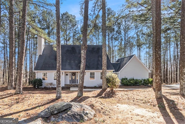 view of new england style home