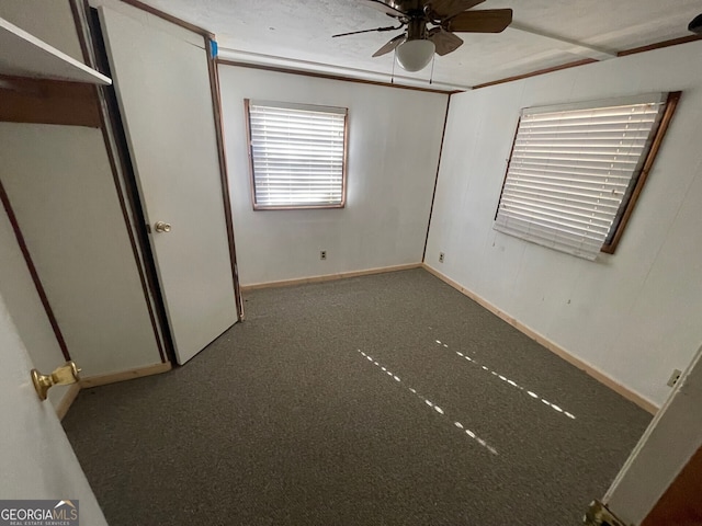 unfurnished bedroom featuring ceiling fan