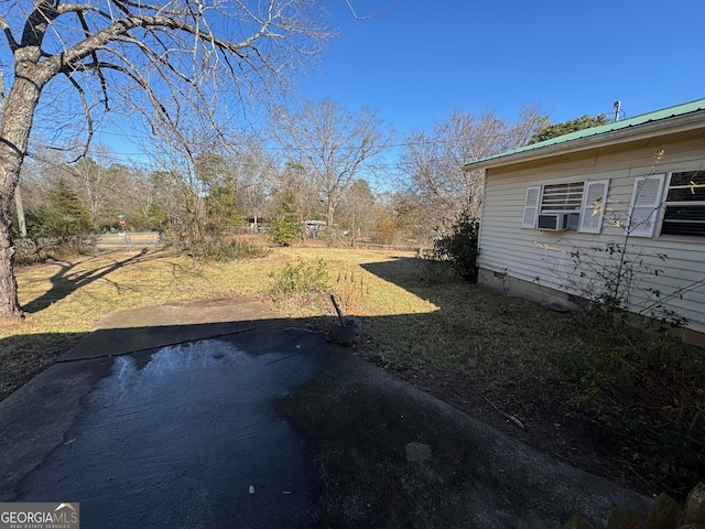 view of yard featuring a patio and cooling unit