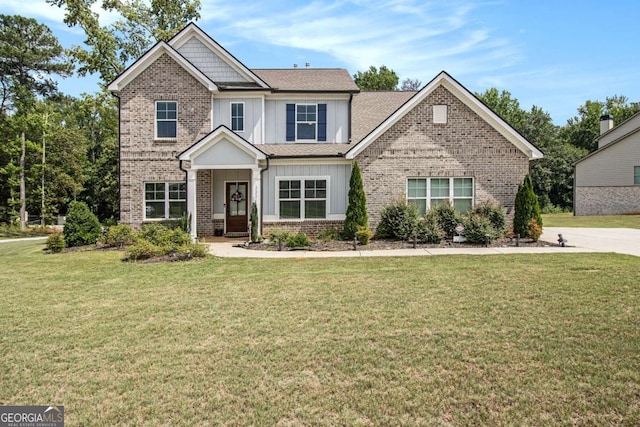 craftsman inspired home with a front lawn