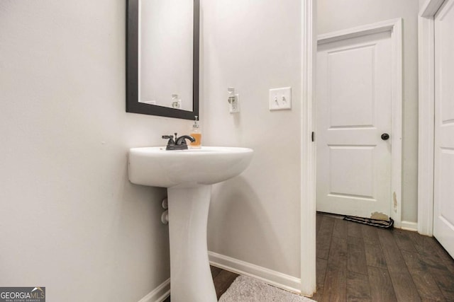 bathroom featuring hardwood / wood-style flooring