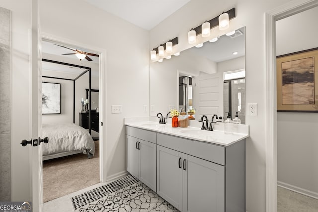 bathroom featuring vanity, tile patterned floors, and ceiling fan