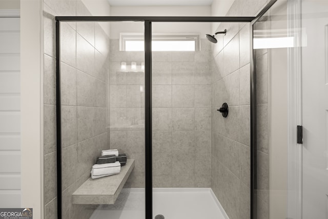 bathroom featuring walk in shower