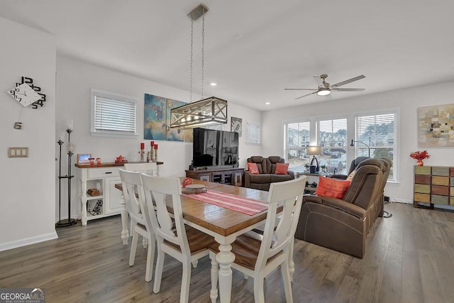 dining room featuring hardwood / wood-style floors and ceiling fan