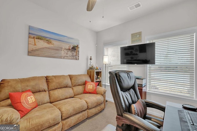 office featuring ceiling fan and carpet flooring