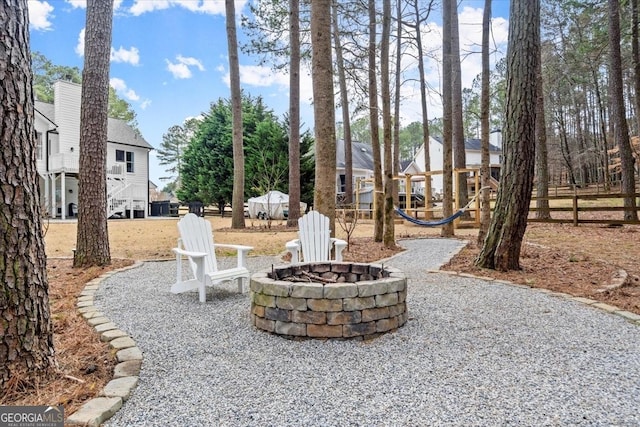 view of patio / terrace featuring a fire pit