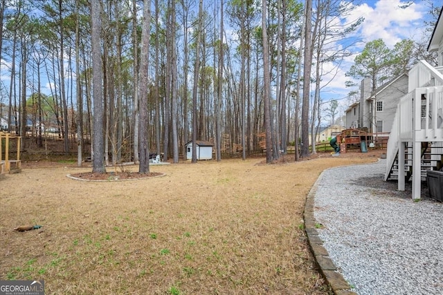 view of yard with a storage shed