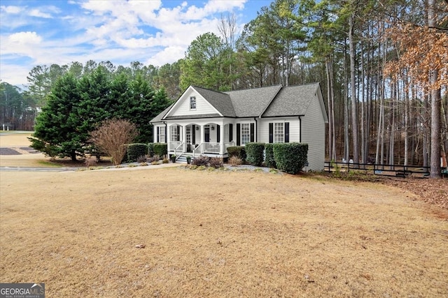 view of front facade with a porch and a front yard