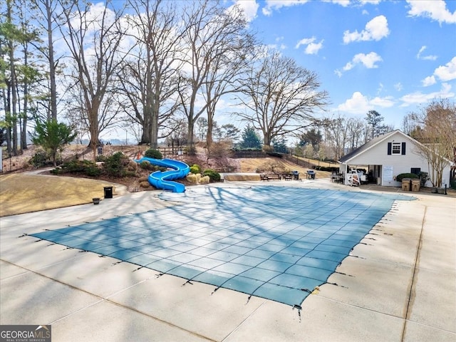 view of swimming pool featuring a patio area