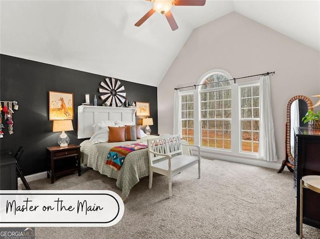 bedroom featuring high vaulted ceiling, ceiling fan, and carpet