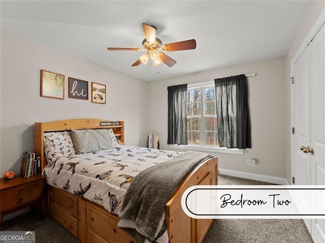 bedroom with a closet, ceiling fan, and carpet