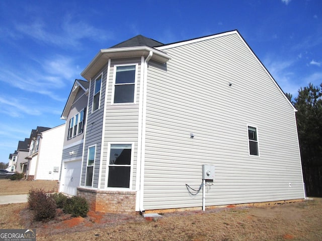 view of home's exterior featuring a garage