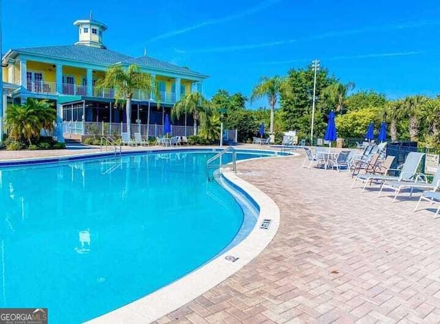 view of pool with a patio