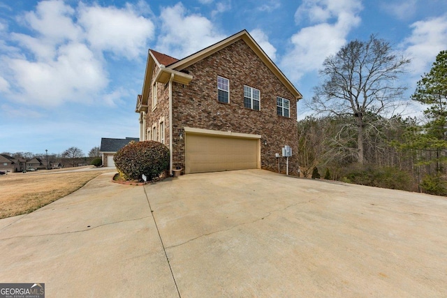 view of side of property featuring a garage