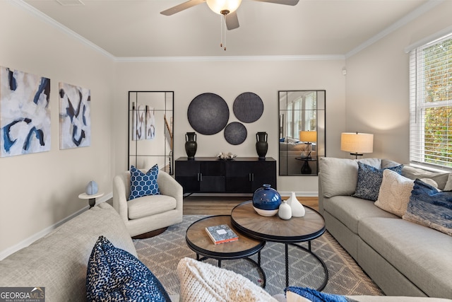 living room featuring hardwood / wood-style flooring, ornamental molding, and ceiling fan