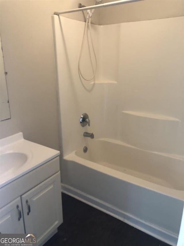 bathroom featuring vanity and bathtub / shower combination