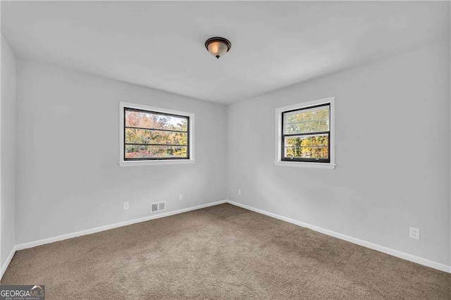 view of carpeted spare room