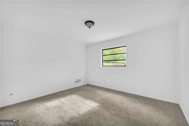 empty room featuring carpet flooring