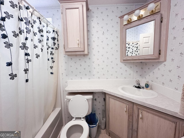 full bathroom with vanity, shower / tub combo with curtain, and toilet