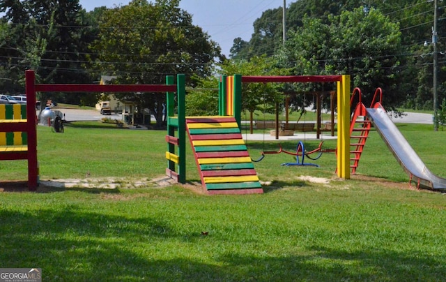 view of play area with a yard