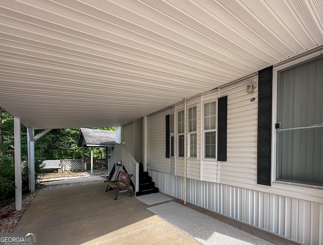 view of patio / terrace featuring a carport