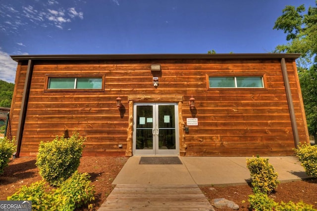 back of house with french doors