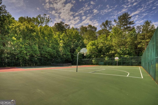 view of sport court featuring tennis court