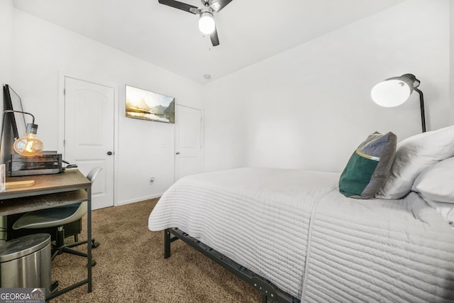 bedroom with dark colored carpet and ceiling fan