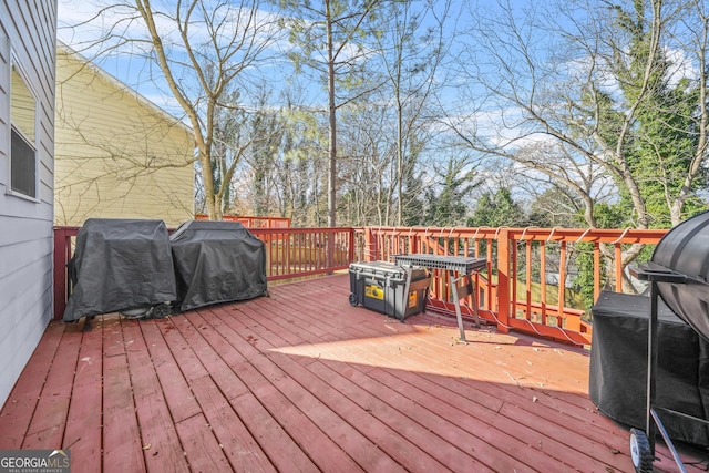 deck featuring a grill