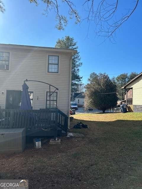 view of property exterior featuring a yard