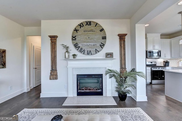 living room featuring dark hardwood / wood-style flooring