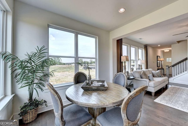 dining room with dark wood-type flooring