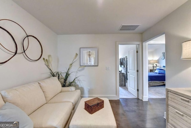 living room featuring dark hardwood / wood-style flooring