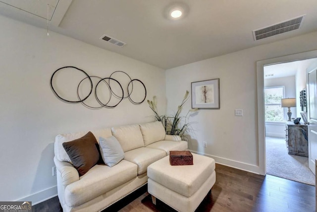 living room with dark hardwood / wood-style floors