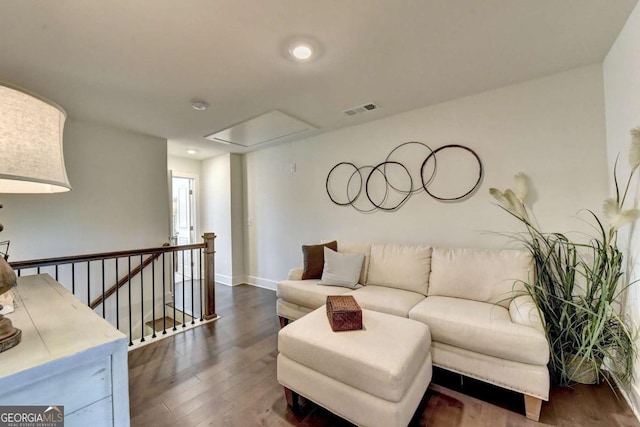 living room featuring dark hardwood / wood-style floors