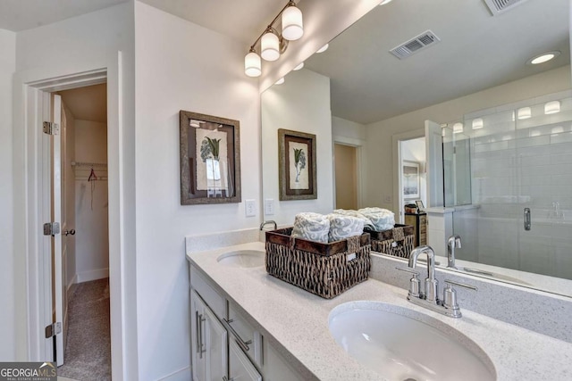 bathroom featuring vanity and walk in shower