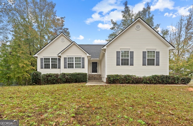 view of front facade with a front yard