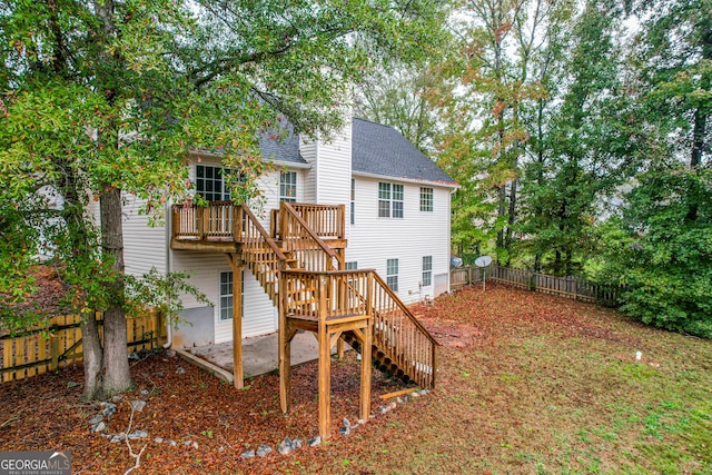 rear view of house with a deck