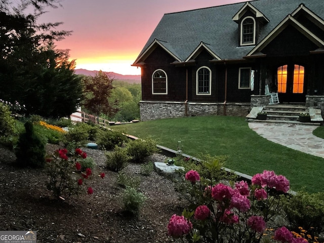 4431 Furman Gribble Rd, Young Harris, GA 30582 - yard at dusk featuring a lawn
