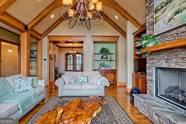4431 Furman Gribble Rd, Young Harris, GA 30582 - living area with a chandelier, wood finished floors, a fireplace, recessed lighting, and built in features