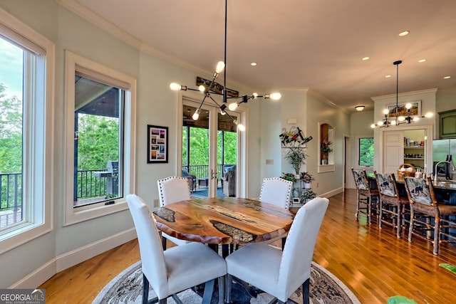 4431 Furman Gribble Rd, Young Harris, GA 30582 - dining space with a chandelier, ornamental molding, light wood-type flooring, baseboards, and recessed lighting