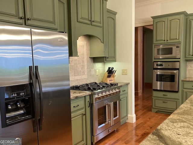 4431 Furman Gribble Rd, Young Harris, GA 30582 - kitchen with appliances with stainless steel finishes, green cabinetry, and ornamental molding