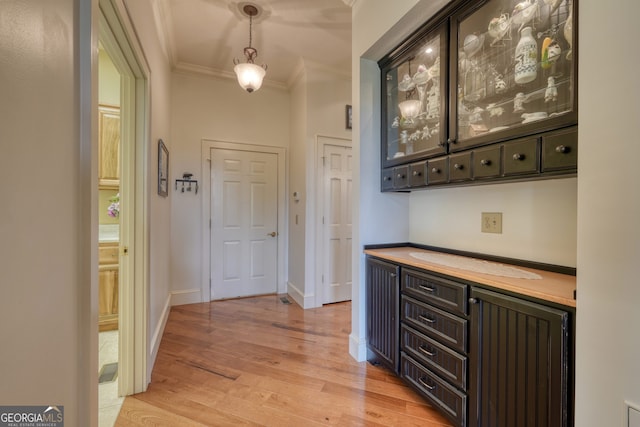4431 Furman Gribble Rd, Young Harris, GA 30582 - hallway with ornamental molding, light wood-style flooring, and baseboards