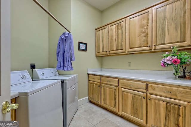 4431 Furman Gribble Rd, Young Harris, GA 30582 - washroom with washer and clothes dryer, cabinet space, and light tile patterned floors