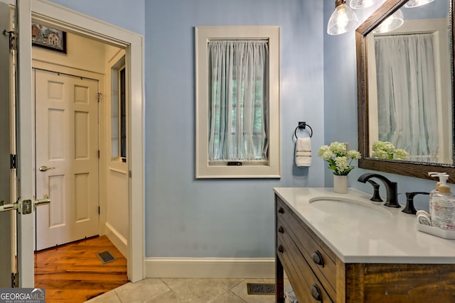 4431 Furman Gribble Rd, Young Harris, GA 30582 - bathroom featuring tile patterned floors, baseboards, and vanity