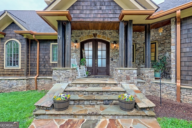 4431 Furman Gribble Rd, Young Harris, GA 30582 - doorway to property with stone siding, french doors, and a porch