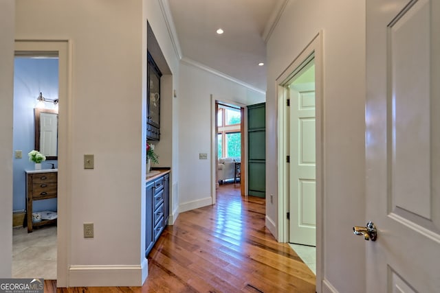 4431 Furman Gribble Rd, Young Harris, GA 30582 - corridor featuring ornamental molding, light wood-style floors, baseboards, and recessed lighting