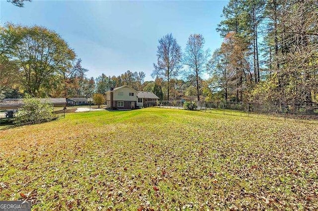 view of yard featuring fence