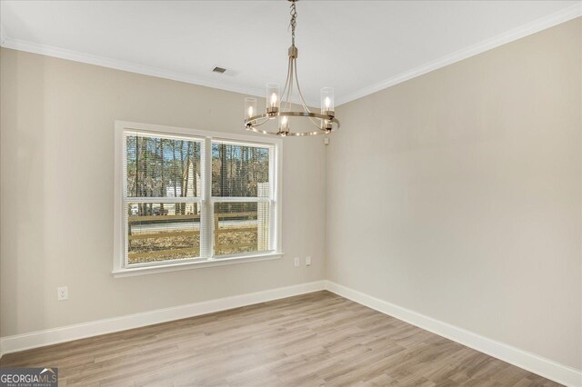 unfurnished room featuring ornamental molding, carpet flooring, ceiling fan, and a tray ceiling