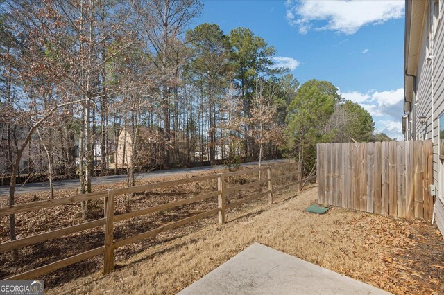 view of community featuring a lawn